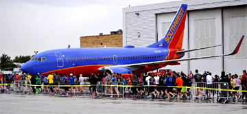 More than 700 runners, walkers and aviation enthusiasts participated in Chicago Midway International Airport's first-ever run on the airfield