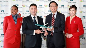 Cathay Pacific General Manager Revenue Management Mr James Tong presents a Cathay Pacific aircraft model in a special “Asia’s world city” livery to Air Seychelles Chief Executive Officer Mr Cramer Ball following the signing of the code-share agreement between the two airlines.
