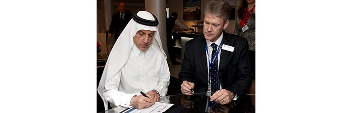 On Day Two of the Dubai Air Show, Qatar Airways Chief Executive Officer, Akbar Al Baker (left) and Rolls Royce President - Aerospace, Tony Wood signing an agreement for Trent 700 engines to power five Airbus A330 freighter aircraft