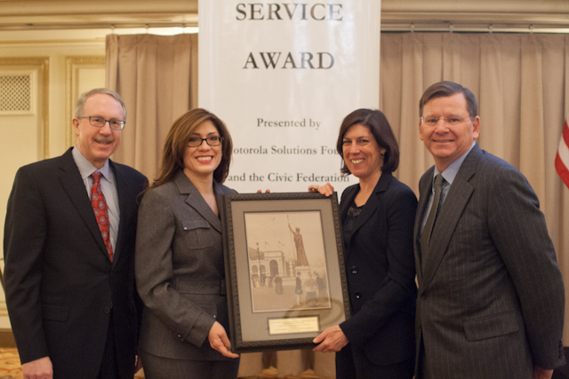 Pictured left to right: Mark Davis, Chairman, Civic Federation; Rosemarie S. Andolino, Commissioner, CDA; Michelle Warner, Corporate VP, Deputy General Counsel and Secretary, Motorola Solutions; and Laurence Msall, President, Civic Federation with the Motorola/Civic Federation "Excellence in Public Service" Award at the Palmer House Hilton in Chicago on December 17, 2013.