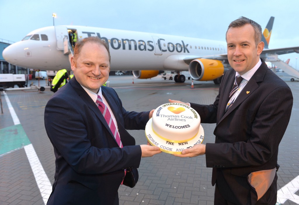 Thomas Cook station manager Jason Whiteside is pictured with Uel Hoey business development director at Belfast International Airport as they welcome the new Thomas Cook Airbus A321 to Belfast International Airport