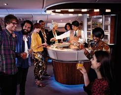 The Emirates A380 Onboard Lounge offers passengers a chance to socialise and network over specially selected beverages and canapés.
