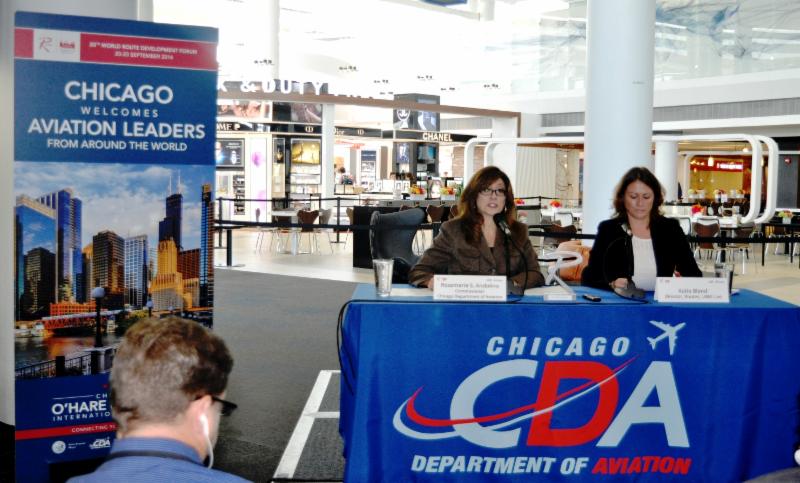 Rosemarie S. Andolino, Commissioner, Chicago Department of Aviation (left) and Katie Bland, Director, Routes and UBM Live (right) speak to reporters at a news conference in Terminal 5 at O'Hare International Airport today.