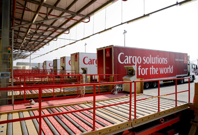 Offloading cargo bound for the SkyCargo warehouse at DWC