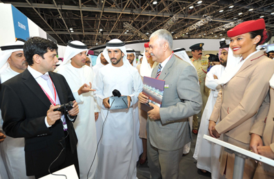 HH Sheikh Hamdan bin Mohammed bin Rashid Al Maktoum, Crown Prince of Dubai visits Emirates’ stand at GITEX Technology Week 2014 at Dubai International Convention & Exhibition Centre. Sheikh Hamdan is seen with Oculus, one of the featured Emirates’ proprietary technology applications. With Sheikh Hamdan (on his right) is HE Helal Saeed Almarri, director general, Dubai Department of Tourism and Commerce Marketing
