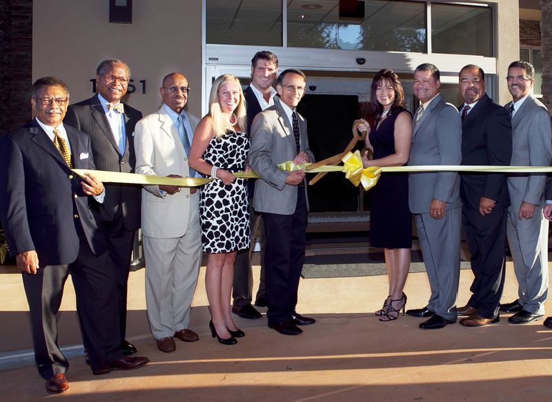 Ribbon cutting (2011) for the grand opening of the SpringHill Suites by Marriott Lake Charles.  From left to right:  Jack Ezzell,  Alvin Schexnider, William Grace, Tamra Markham (hotel management group), Lake Charles City Councilman John Falgout, Lake  Charles Mayor Randy Roach, Evette Gradney, John Biagas, Mark Biagas, Randy Biagas.