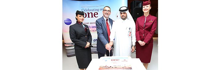 Hamad International Airport Chief Operating Officer, Mr. Badr Al Meer (second from right) and Qatar Airways Chief Planning Officer, Mr. Richard Roberts (third from right), cut a celebratory cake in commemoration of the first year anniversary of Qatar Airways joining the oneworld global airline alliance.
