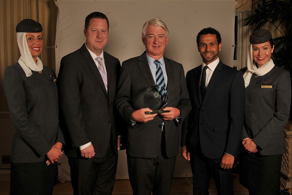 Etihad Airways executives and cabin crew receive award for 2014 Airline of the Year at Global Traveler’s “11th Annual GT Tested Reader Survey Awards”, including (from left to right) Michael Kohlstrand, Vice President Western USA, Geert Boven, Senior Vice President of the Americas and Mohammed Hasan Rahma, Business Development Manager. 