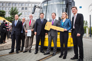 Bombardier Transportation President and Chief Operating Officer Dr. Lutz Bertling presents the 100th FLEXITY to BVG