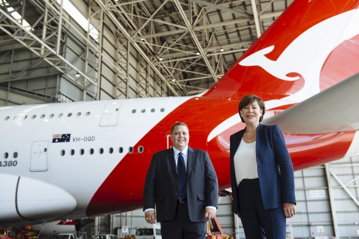 Image Caption: Vodafone Director of Sales Ben McIntosh (left) and Qantas Loyalty CEO Lesley Grant celebrate new partnership