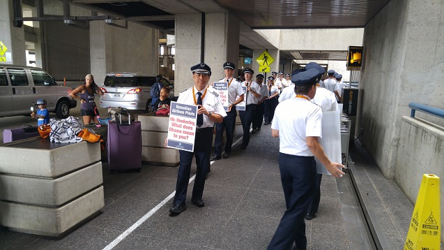 An estimated 300 Hawaiian Airlines pilots conducted informational picketing at Honolulu International Airport.