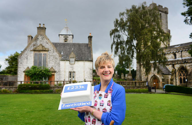 Dyslexia Scotland’s Celia Richardson with her ‘£233k’ Madeira cake at Cowane’s Hospital in Stirling