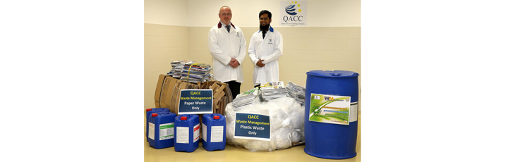 Mr. Paul Thomson Acting Senior Vice President for Qatar Aviation Catering Company (left) and Mr. Mohammed Shoaib, Uniform and Linen Duty Officer QACC (right), with some of the materials due to be recycled under the new programme.