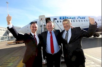 LJLA’s CEO Andrew Cornish (centre) celebrating with Blue Air’s Chief Operating Officer Tudor Constantinescu (far left) and CEO Gheorghe Racaru (far right) following the news last month that Blue Air are to make Liverpool John Lennon Airport (LJLA) their newest European base.