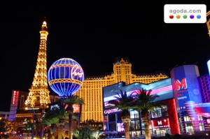 Las Vegas, USA - November 30, 2011: The Paris Las Vegas is a hotel and casino in Nevada.  Seen on the left are the venues replicas of the Eiffel Tower and the Montgolfier Balloon adorned in bright lights.