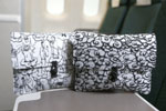 Cathay Pacific’s newly launched amenity kit for Premium Economy Class features two exclusive design - “Joy” (left) and “Fortune” (right), by home-grown Hong Kong brand G.O.D.