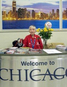 Volunteer Airport Ambassador Lucille Serafin at a Midway Information Booth