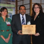 Ahmed Al Haddabi, COO, Abu Dhabi Airports Company (center) accepted a 2012 Airports Going Green Award from Commissioner Rosemarie Andolino (right) and Deputy Commissioner Amy Malick (left).