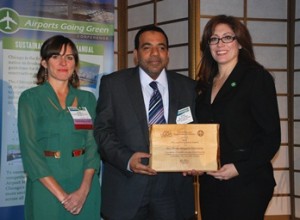 Ahmed Al Haddabi, COO, Abu Dhabi Airports Company (center) accepted a 2012 Airports Going Green Award from Commissioner Rosemarie Andolino (right) and Deputy Commissioner Amy Malick (left).