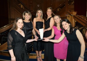 The Commercial and Marketing team pictured holding the Award