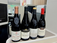 The four featured wines are (from left): Delas, St-Joseph “Les Challeys” 2011, Caves St-Pierre, Crozes-Hermitage 2011, Domaine Mas du Bouquet, Vacqueyras 2010 and Ogier, Rasteau “Helianthe” 2011.