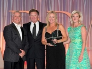 Pictured center are Franz Hanning, Wyndham Vacation Ownership President and CEO, and Sarah King, EVP, Human Resources, accepting the ARDA ACE Philanthropic of the Year Award.
