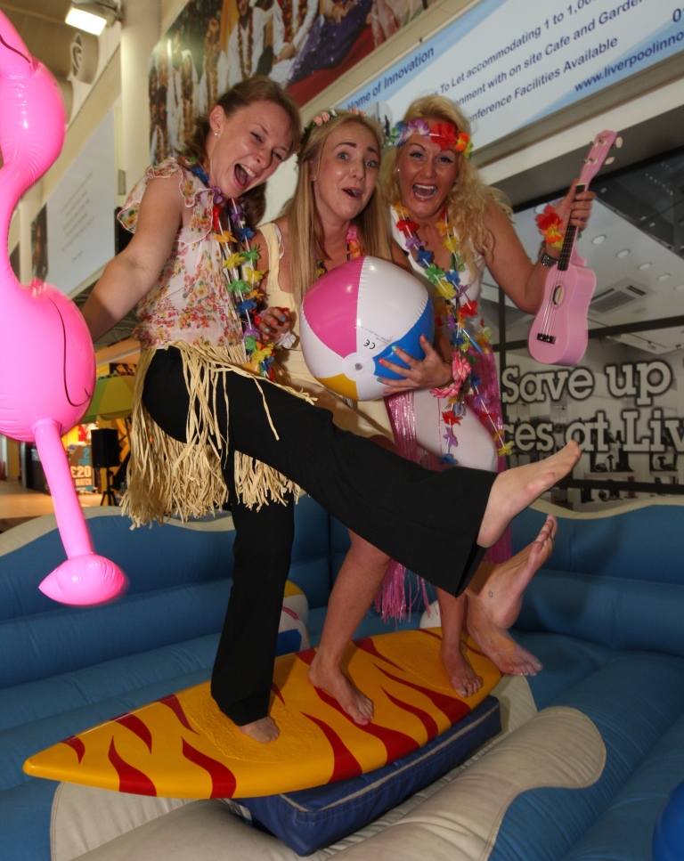 Surfing JLA - Staff and passengers join in the fun at the airport