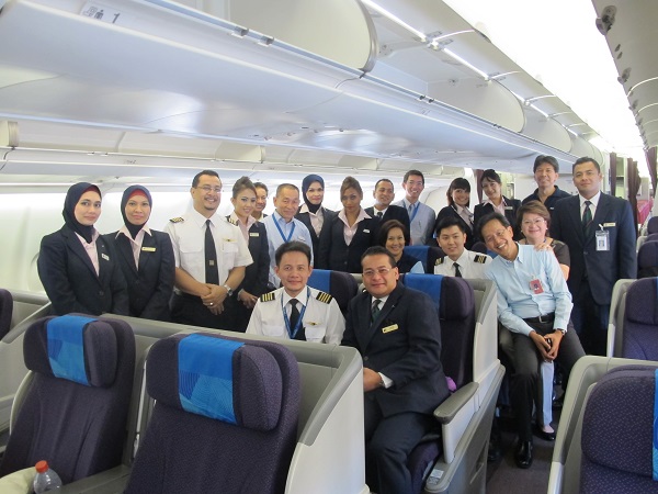 Ops Pyramid: The tech and cabin crew together with some of MAS’ senior management staff before the take-off.