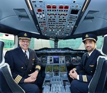 Captain Daniel Wyss (left) and First Officer Ahmad Ali Naqib (right) pictured in the cockpit prior to flying the commemorative A380 flight from Dubai to Zurich today.