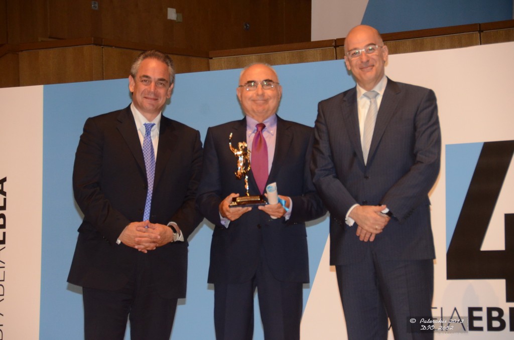Mr. Theodoros Vassilakis Chairman of AEGEAN, accepting the Corporate Social Responsibility Plan award offered by Mr. Nikos Dendias, Minister of Development and Competitiveness, and Mr. Konstantinos Michalos, Chairman of ACCI.