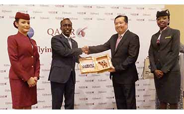Djibouti’s Minister of Transport and Equipment, His Excellency Moussa Ahmad Hassan, second from left, presents Qatar Airways Vice President Africa Jared Lee with a gift during a corporate lunch commemorating the launch of the airline’s direct flights to Djibouti in Africa.