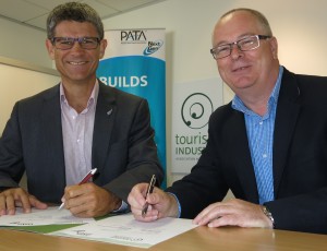 L/R: Chris Roberts, Chief Executive, TIA, and Chris Flynn, Regional Director – Pacific, PATA, sign the MOU.