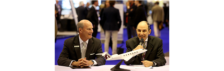 Qatar Airways Group Chief Executive, His Excellency Mr. Akbar Al Baker, and Gulfstream President, Larry Flynn, announcing the Qatar Executive purchase of 30 Gulfstream jets at EBACE.