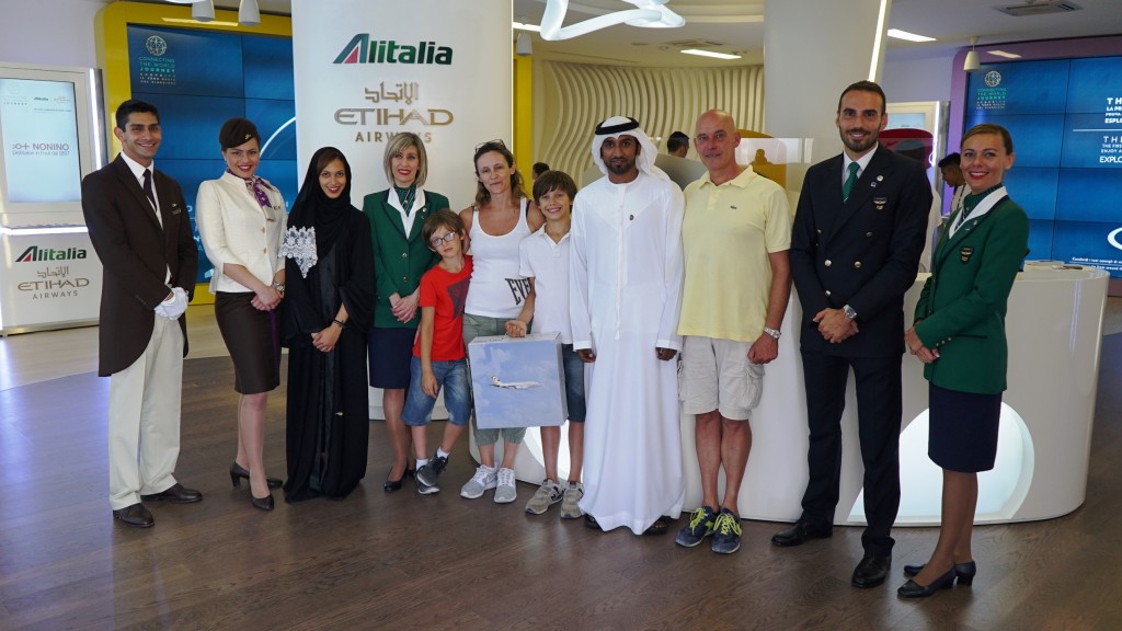 Photo caption: The Nonino family surrounded by Etihad Airways Graduate Managers and Etihad Airways and Alitalia cabin crew.