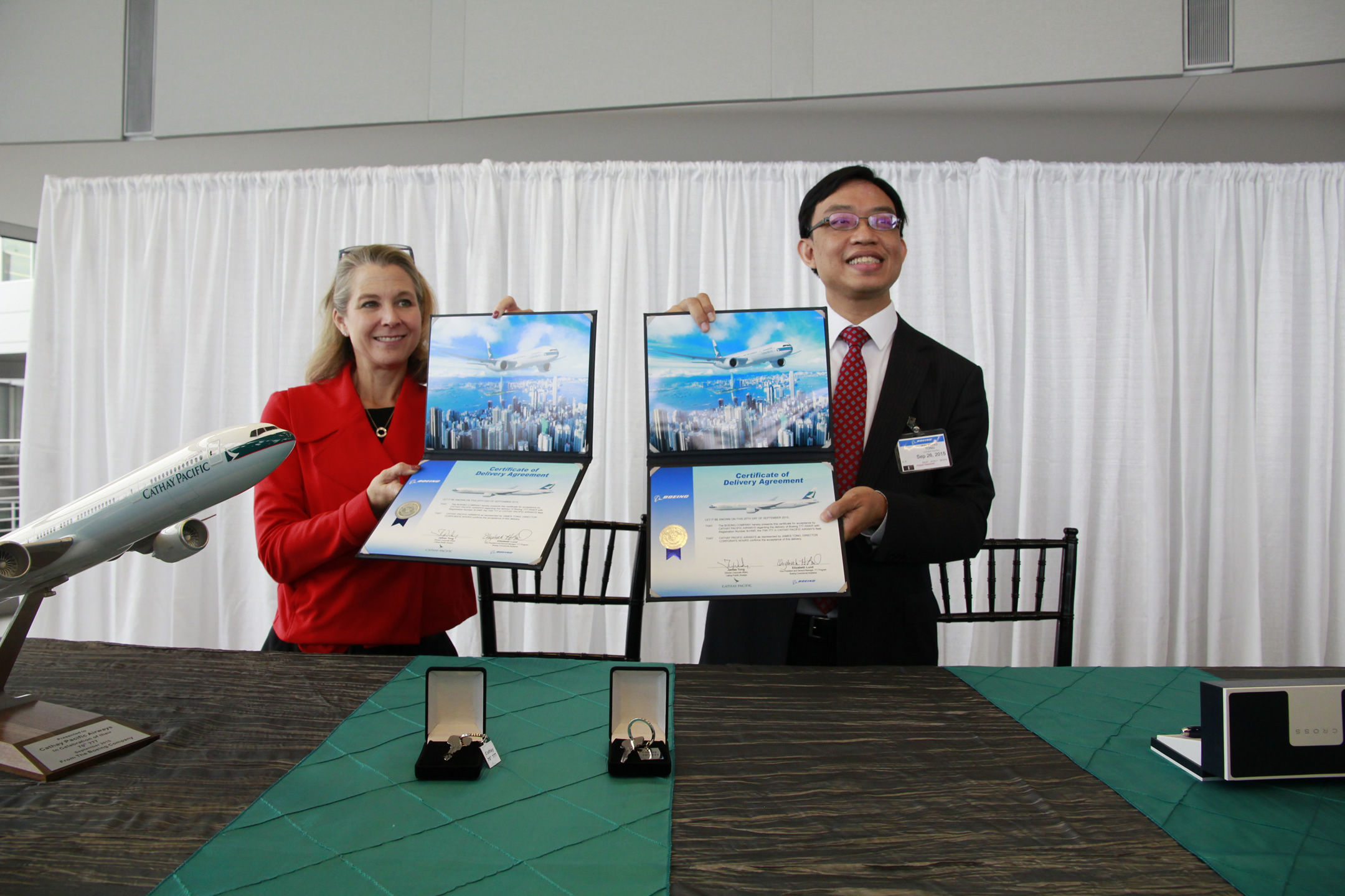 Ms Elizabeth H Lund, Vice President and General Manager, 777 Program and Everett Site, Boeing Commercial Airplanes (left) and Mr James Tong, Director Corporate Affairs, Cathay Pacific Airways at the signing ceremony for Cathay Pacific's 70th 777 aircraft. Cathay Pacific took delivery of the 777-300ER aircraft on 26 September 2015 and is Asia's largest operator of the 777 fleet.