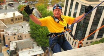 Choice Hotels International President and CEO rappels down 15 stories at the 2 Bethesda Metro Center to raise awareness on addiction