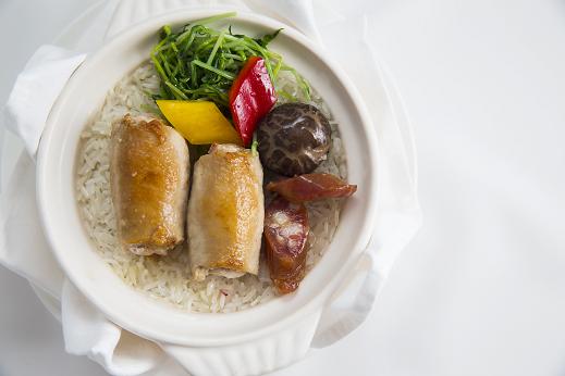 Steamed rice with Berkshire pork and goose liver roulade with Chinese preserved sausages in hot pot casserole for First Class passengers