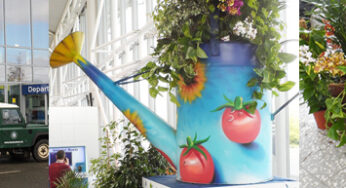 Bristol Airport hosts Cleeve Nursery’s giant-sized watering can as part of the Chelsea Fringe Festival