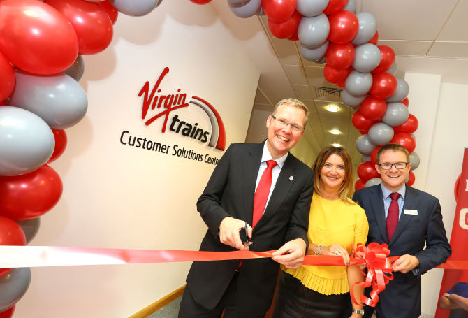 The leader of Newcastle City Council, Nick Forbes (left), opens Virgin Trains' Customer Solutions Centre with Virgin's Customer Experience Director Alison Watson and Managing Director David Horne