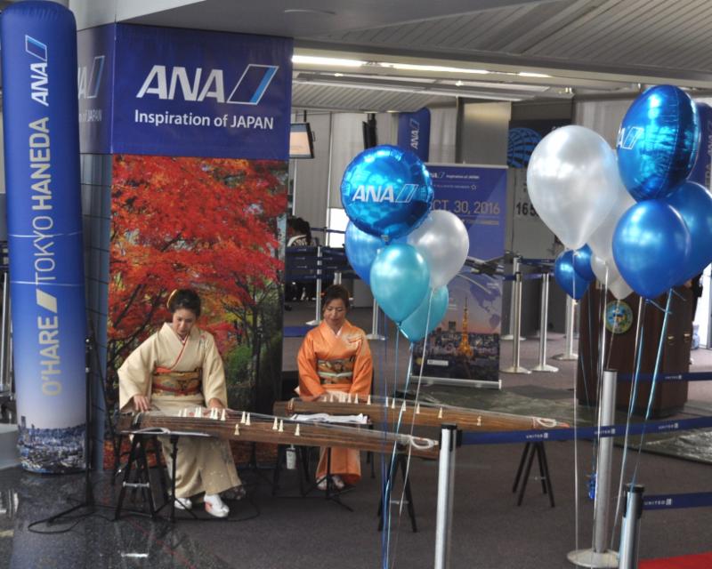 Musicians play the koto during the celebration at                               Musicians, artists, and ANA and CDA officials celebrate ANA/s new service to Haneda, Japan O'Hare of ANA's new route to Haneda