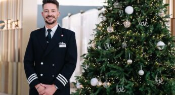 British Airways’ singing pilot, Stuart Beech returns home to Oldham to switch on the town’s Christmas lights