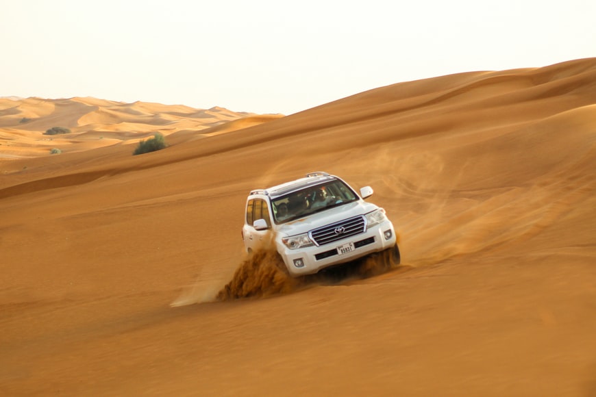 drivfting car on the desert
