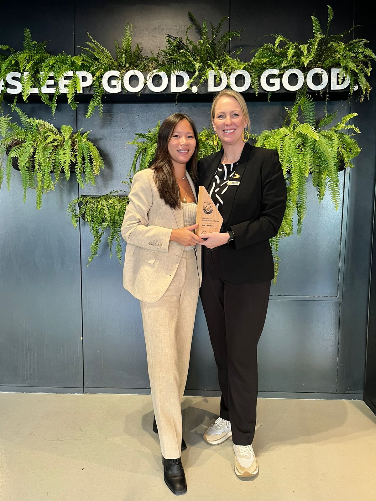 Weeva's Julie Cheetham receiving her Regenerative Travel Changemaker of the Year award from Amanda Ho